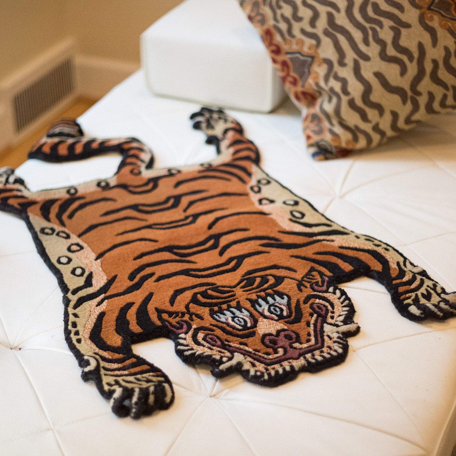 https://www.dharmashop.com/cdn/shop/products/carpets-tibetan-tiger-rug-09-cr058-6591762333742_1500x.jpg?v=1575932538