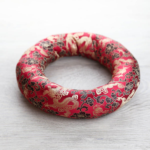 https://www.dharmashop.com/cdn/shop/products/singing-bowls-large-red-singing-bowl-ring-cushion-sz046-29642261135406_600x.jpg?v=1664376351